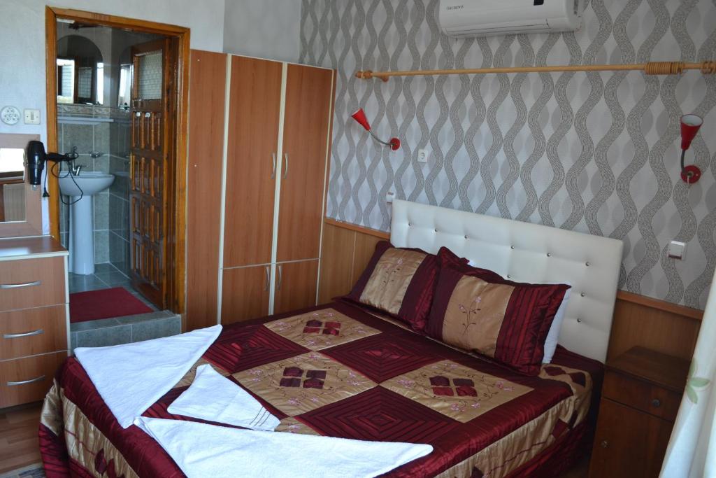 Giường trong phòng chung tại Aspawa Hotel