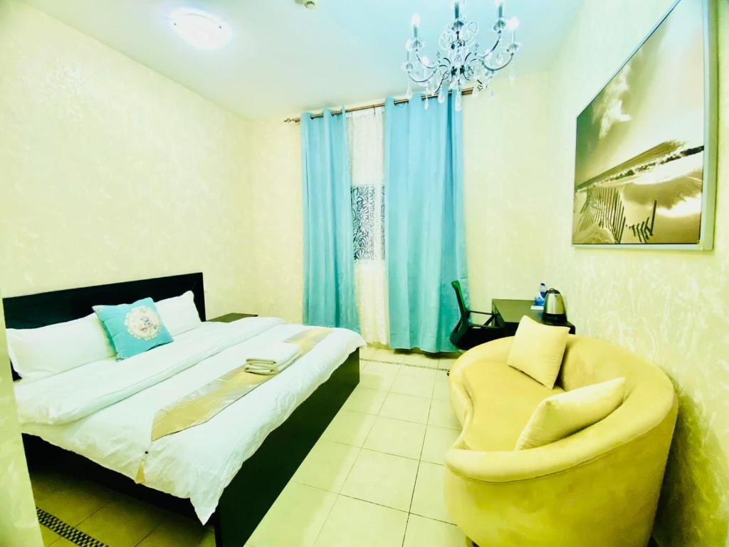 Postel nebo postele na pokoji v ubytování Jin Jie Residence