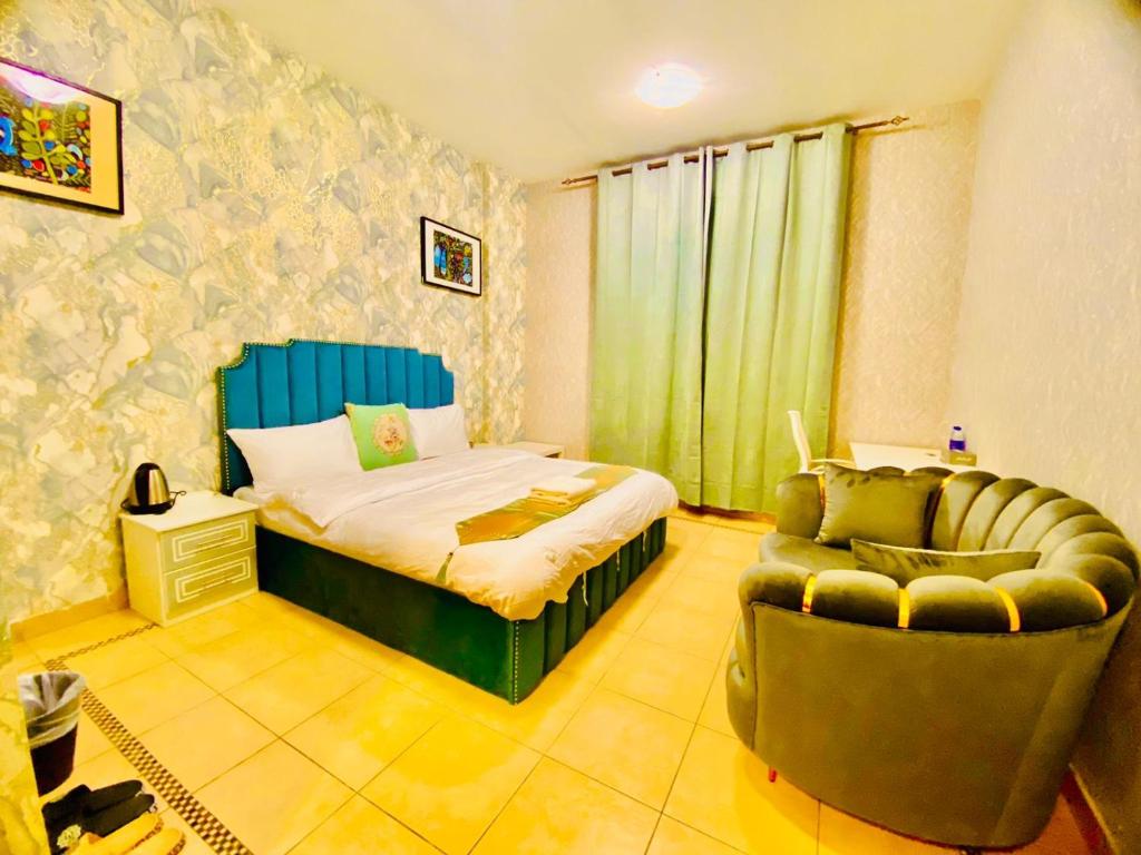 Postel nebo postele na pokoji v ubytování Jin Jie Residence