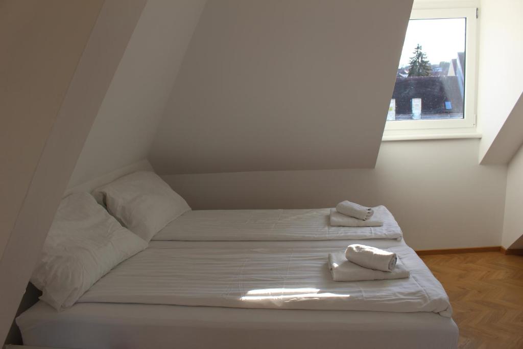Postel nebo postele na pokoji v ubytování Haus Semmi