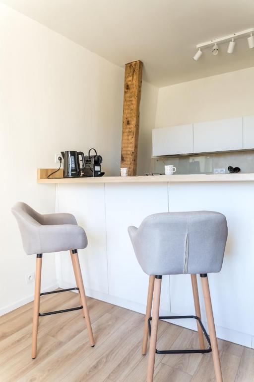 Kuchyňa alebo kuchynka v ubytovaní Logis Cosy sur la Guierle - 1 Chambre