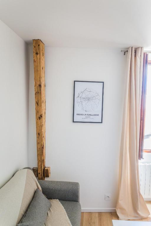 Posedenie v ubytovaní Logis Cosy sur la Guierle - 1 Chambre