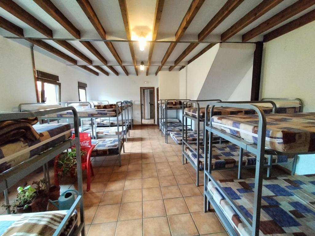 Postel nebo postele na pokoji v ubytování Albergue Don Camino