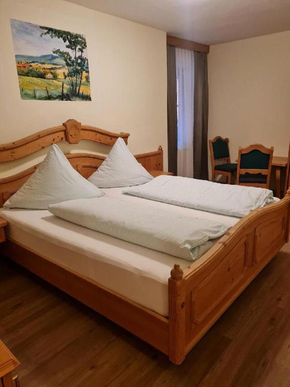 Postel nebo postele na pokoji v ubytování Landhotel Zum Jägerstöckl