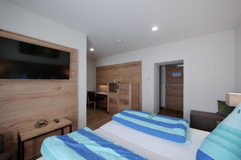 Postel nebo postele na pokoji v ubytování Landhotel Zum Jägerstöckl