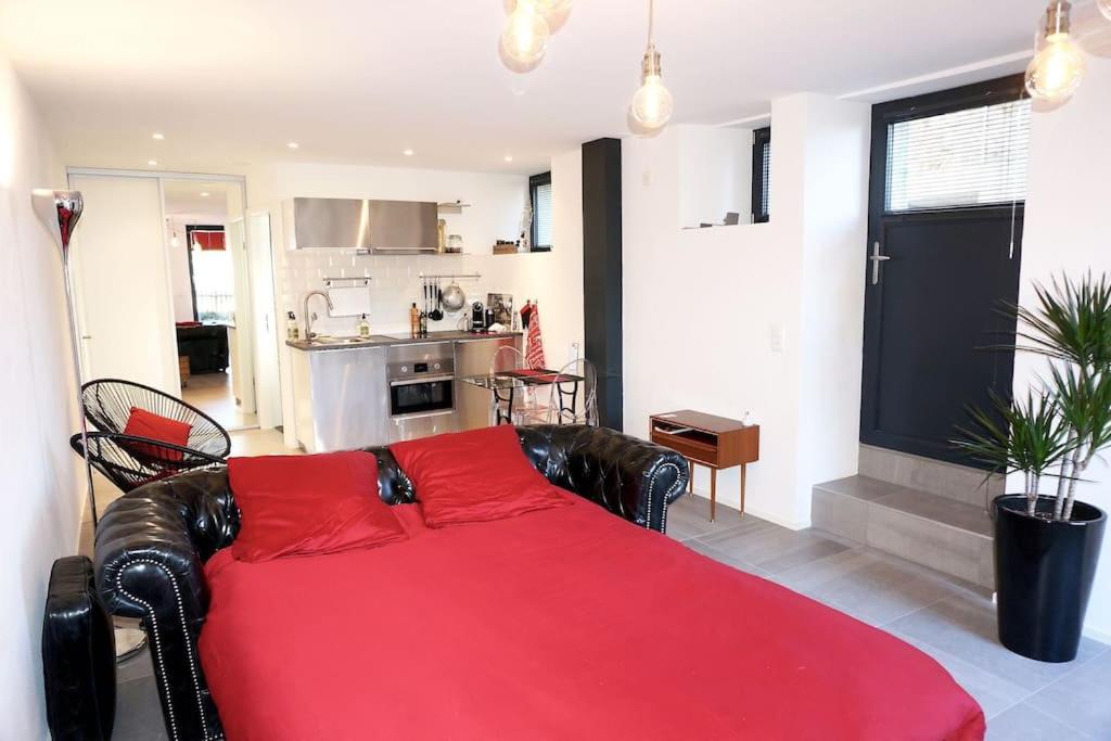 Kuchyň nebo kuchyňský kout v ubytování Beau studio dans ancienne grange rénovée.