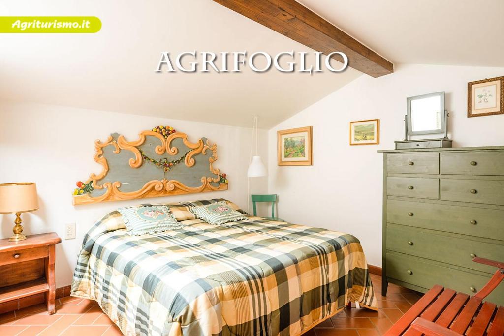 Postel nebo postele na pokoji v ubytování Agriturismo La Pineta