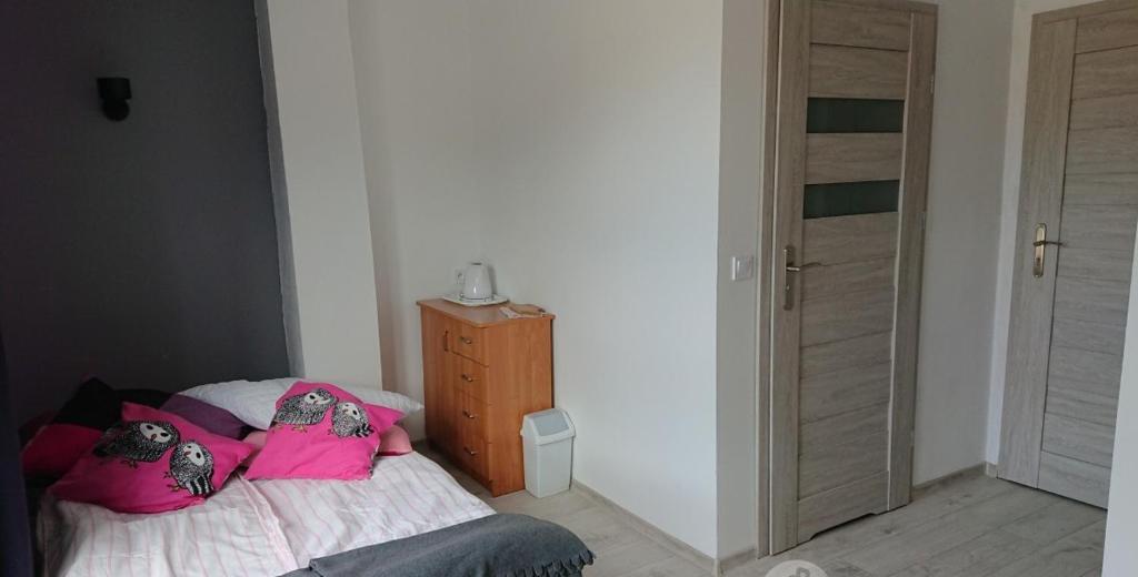 Łóżko lub łóżka w pokoju w obiekcie Sercówka Międzyzdroje