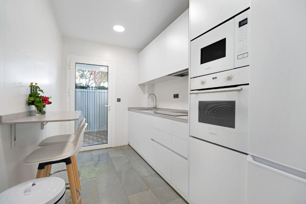 Kuchyň nebo kuchyňský kout v ubytování MARIA DEL MAR SEA APARTMENT