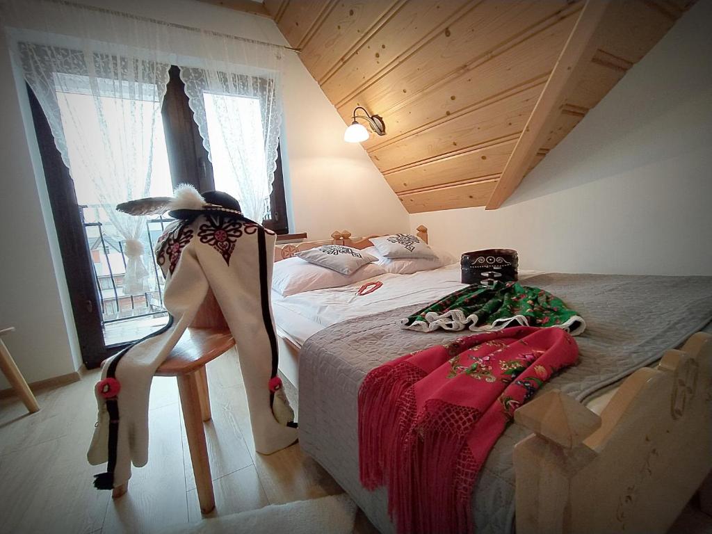 Posteľ alebo postele v izbe v ubytovaní Willa Toporek