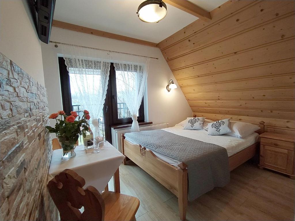 Posteľ alebo postele v izbe v ubytovaní Willa Toporek