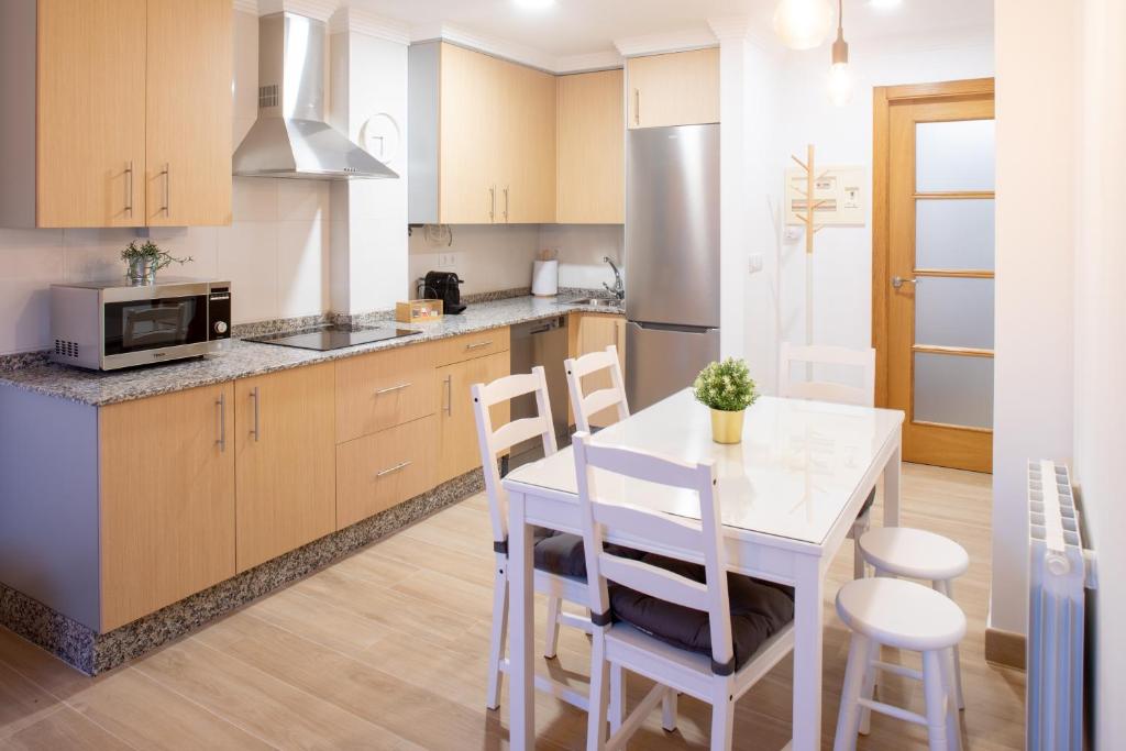 Kuchyň nebo kuchyňský kout v ubytování Apartamento Solpor Bueu