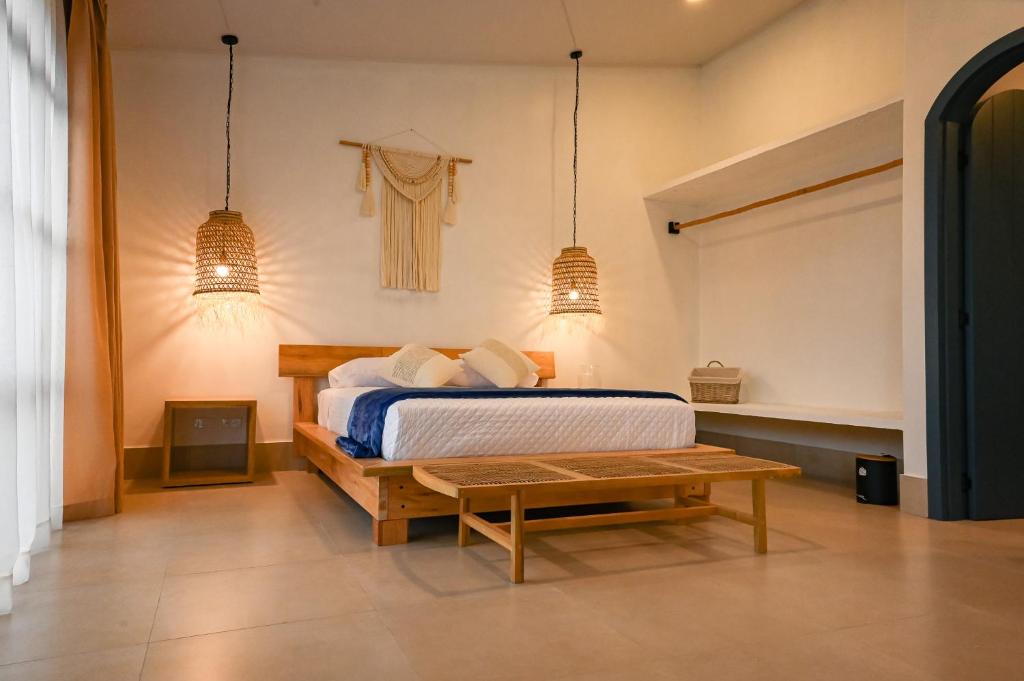 Voodi või voodid majutusasutuse ZAFRA'S HOTEL toas