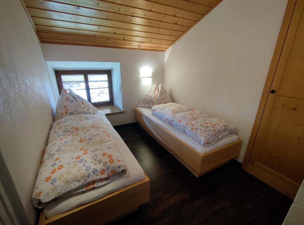 Postel nebo postele na pokoji v ubytování Nigglhofer