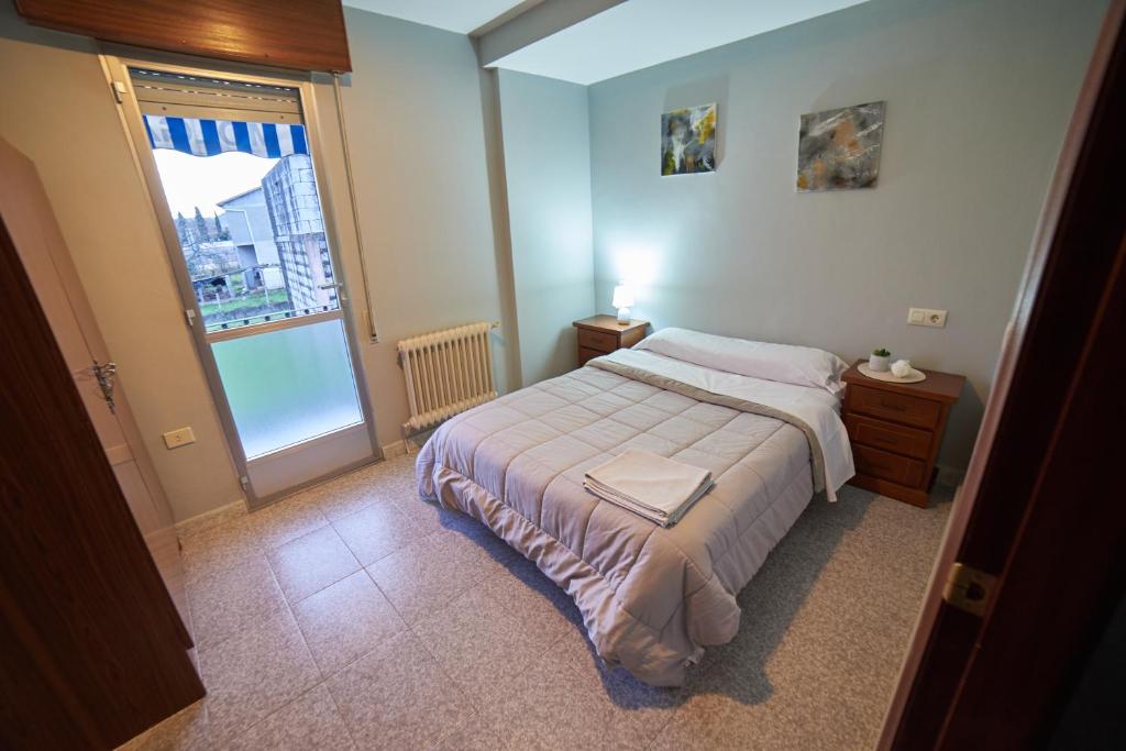 Postel nebo postele na pokoji v ubytování Hostal Molgas