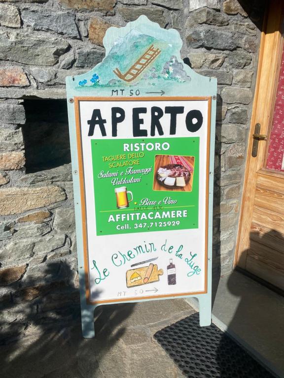 Certifikát, hodnocení, plakát nebo jiný dokument vystavený v ubytování Le Chemin de La Luge