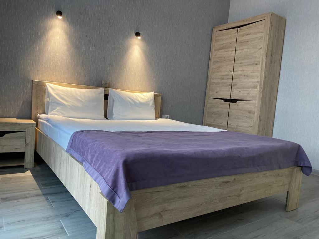 Postel nebo postele na pokoji v ubytování Harmony Resort