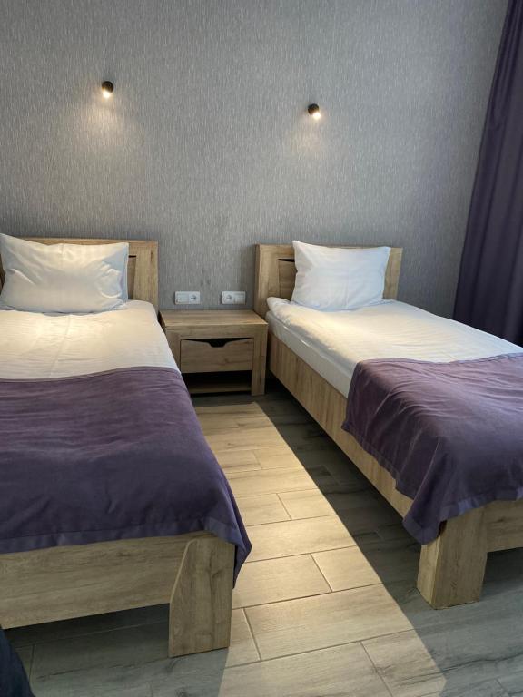 Postel nebo postele na pokoji v ubytování Harmony Resort