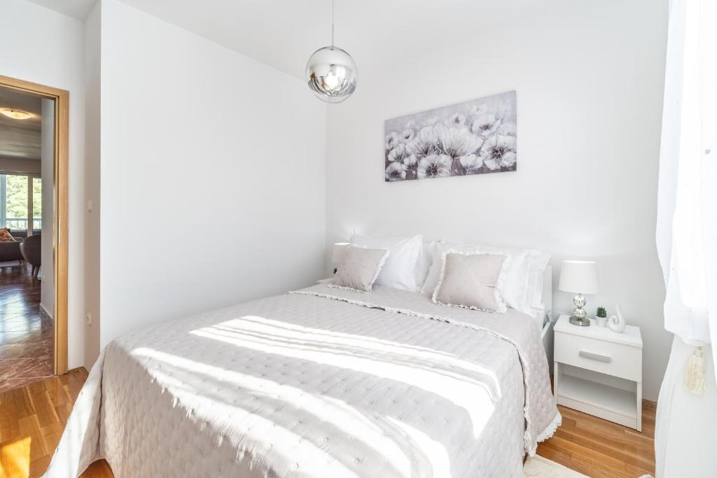 Postel nebo postele na pokoji v ubytování Apartment Mia