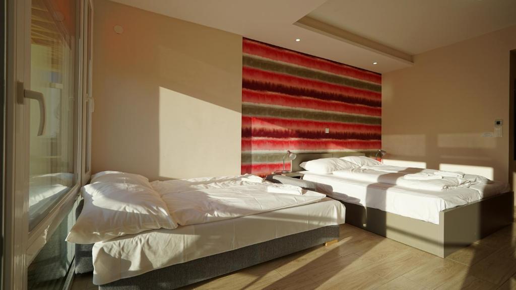 Postel nebo postele na pokoji v ubytování Colors Holiday Hotel