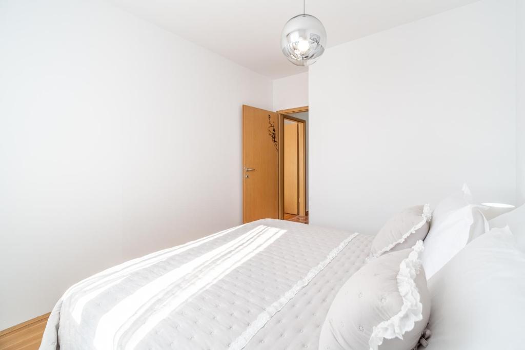 Postel nebo postele na pokoji v ubytování Apartment Mia