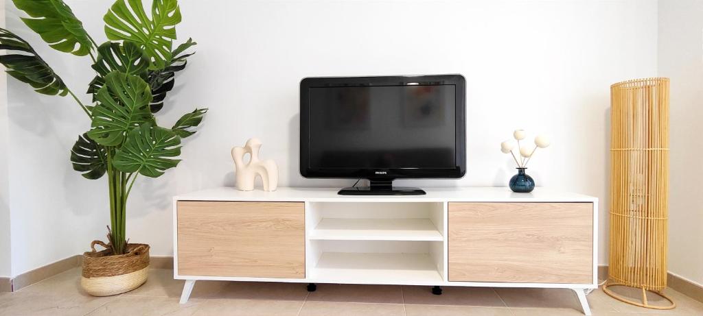Televízia a/alebo spoločenská miestnosť v ubytovaní Apartamento Sueños del Mar II by DENIA COSTA