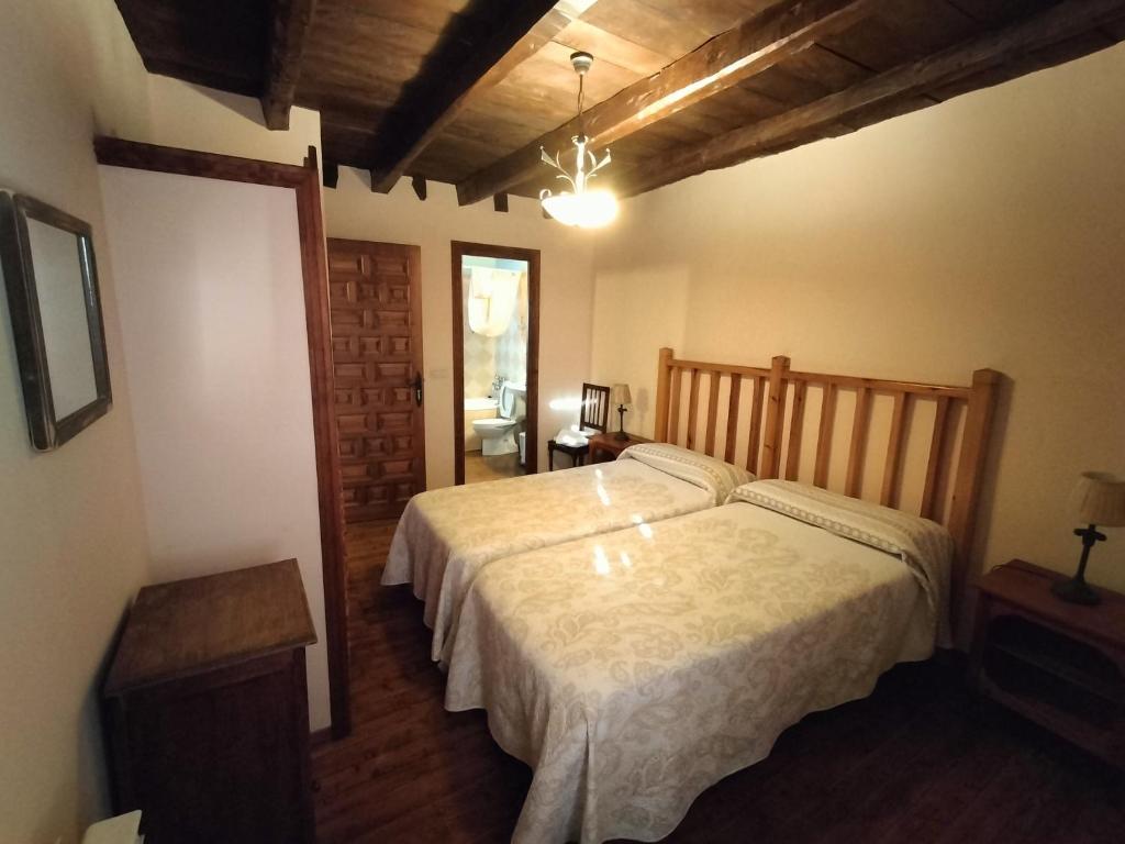 Postel nebo postele na pokoji v ubytování Don Camino Low Cost