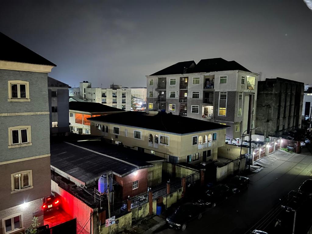 an overhead view of a city at night with buildings at Luxury 2 Bedroom family Apartment in Yaba Lagos in Lagos