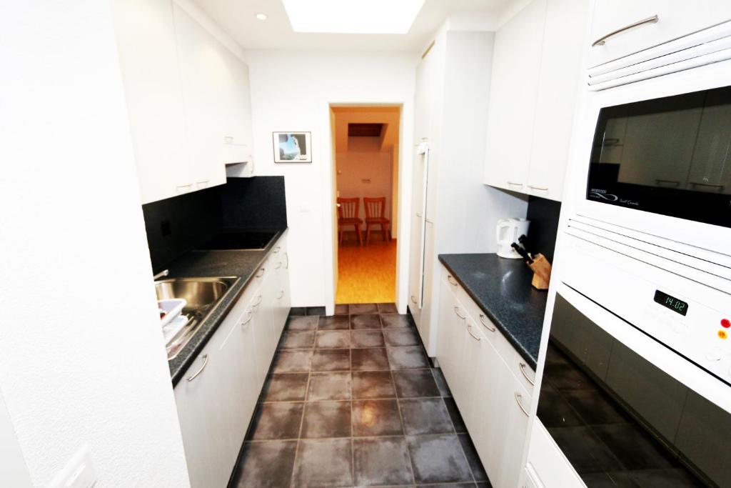 Kuchyň nebo kuchyňský kout v ubytování Haus Cristal