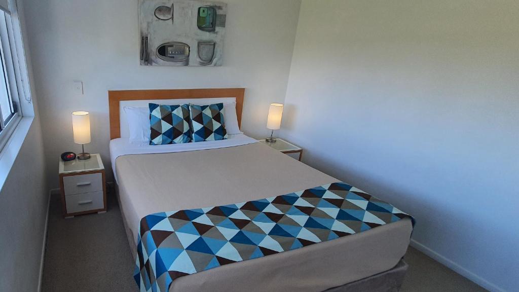 Postel nebo postele na pokoji v ubytování Koola Beach Apartments Bargara