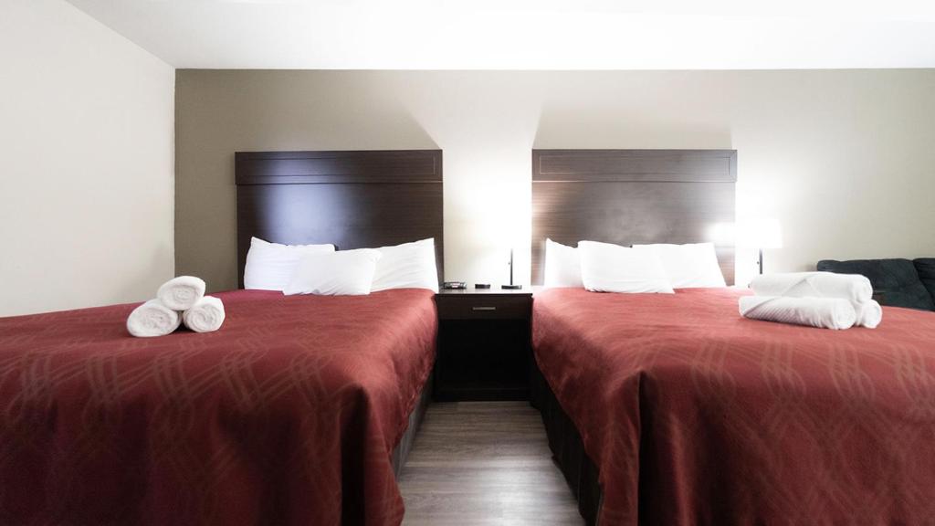 Postel nebo postele na pokoji v ubytování Ocean Star Inn