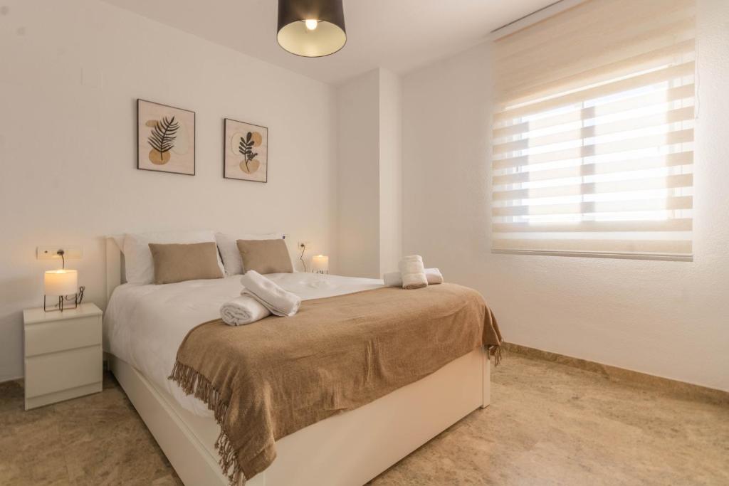 Postel nebo postele na pokoji v ubytování Apartamento con Terraza San Julian Cordoba