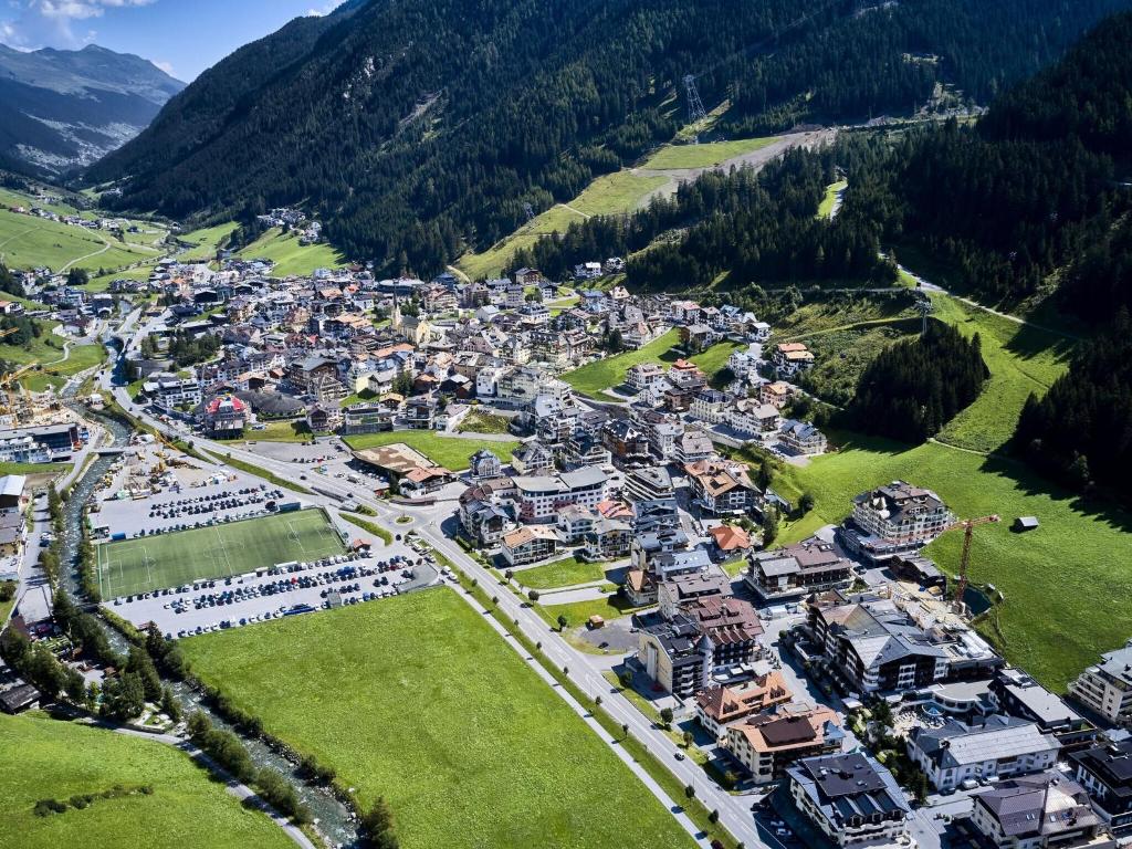 an aerial view of a village in the mountains at Apartment in Ischgl overlooking the mountains in Ischgl
