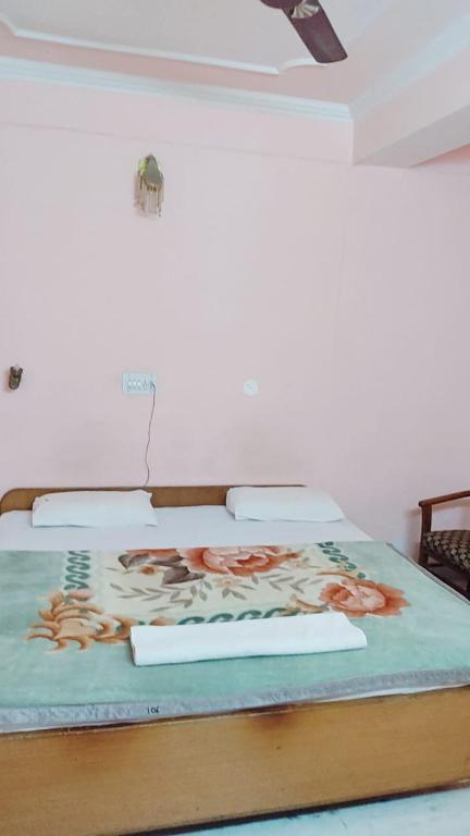 Postel nebo postele na pokoji v ubytování Hotel Atul Regency Narkanda