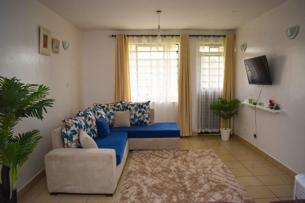 Posezení v ubytování Luxe Homes