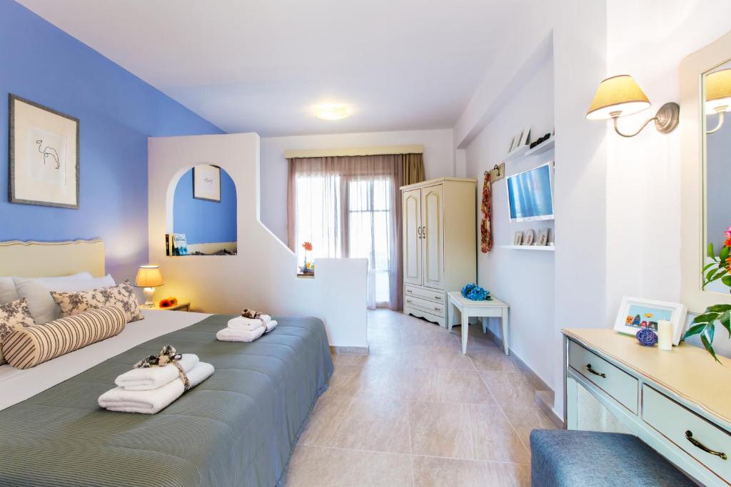 Postel nebo postele na pokoji v ubytování Agrimia Holiday Apartments