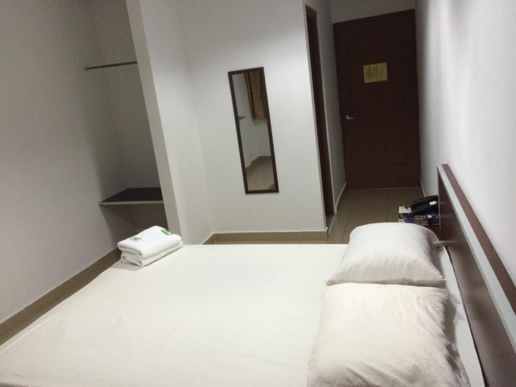 Postel nebo postele na pokoji v ubytování Residencial Turístico El Descanso