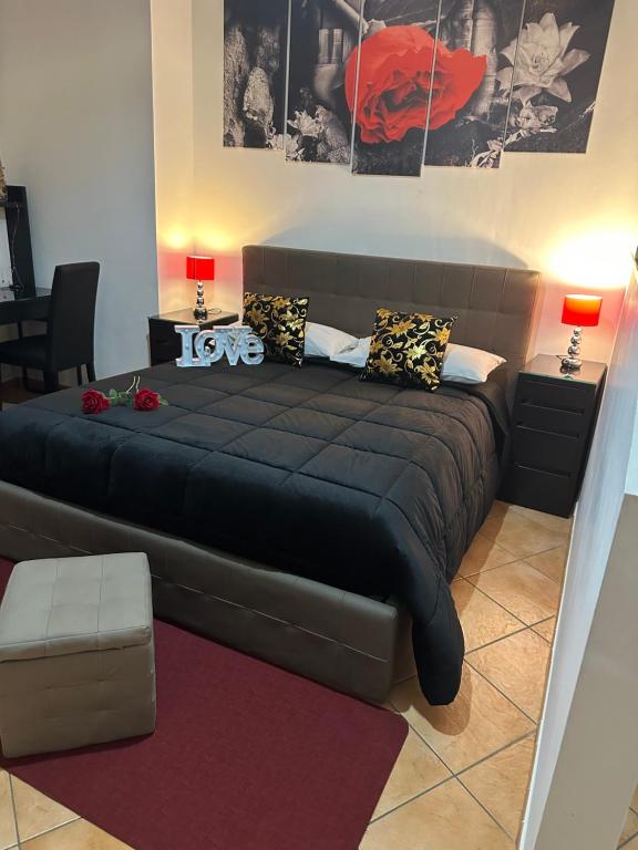 Postel nebo postele na pokoji v ubytování Vanvitelli Home