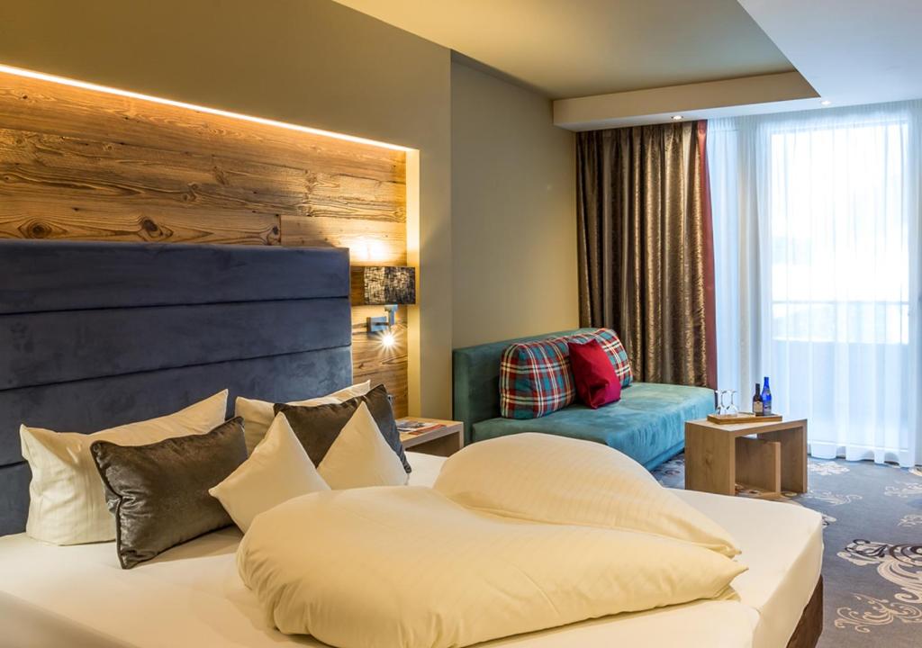 Postel nebo postele na pokoji v ubytování Hotel Bergruh