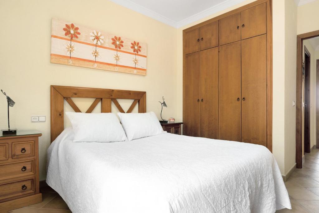 Posteľ alebo postele v izbe v ubytovaní Apartamento El Tajo