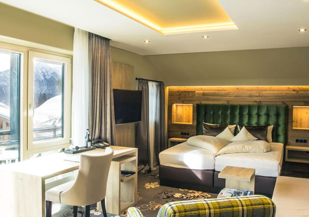 Postel nebo postele na pokoji v ubytování Hotel Bergruh
