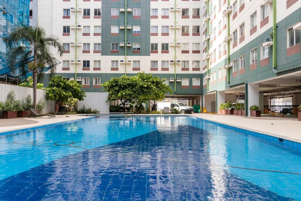 Swimming pool sa o malapit sa Functional 1-br Space in Amaia with Fast Internet