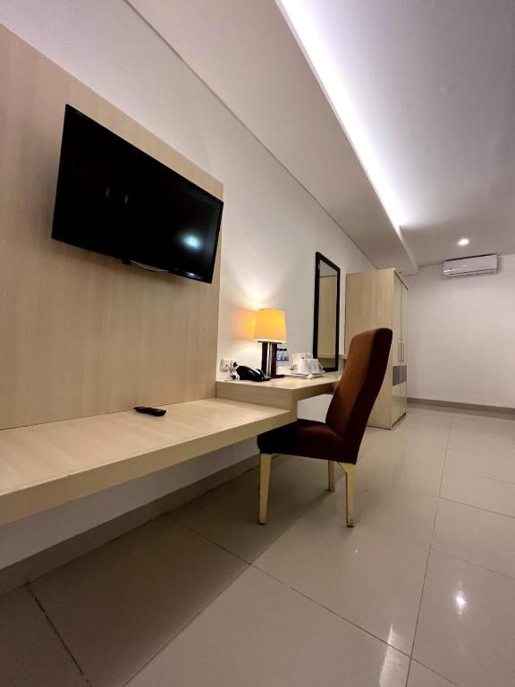 TV a/nebo společenská místnost v ubytování Lembah Permai Resort