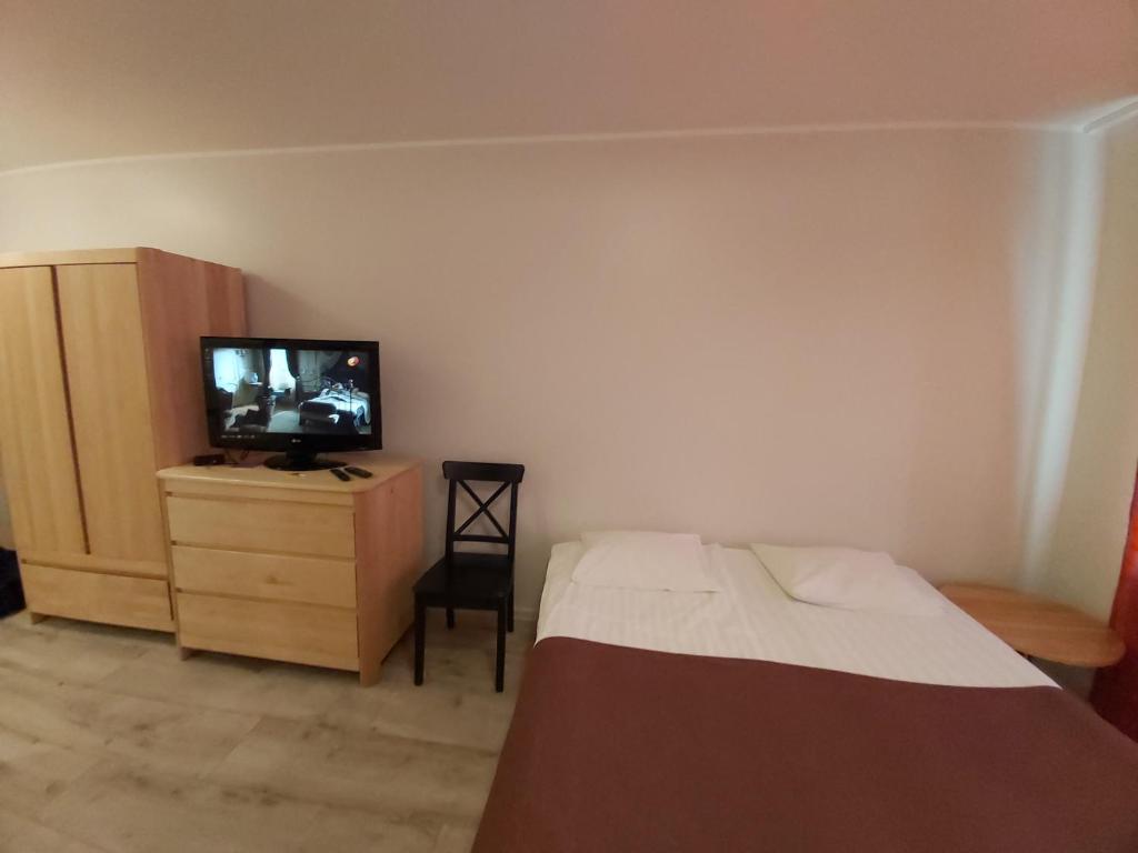 Postel nebo postele na pokoji v ubytování Telliskivi Apartment