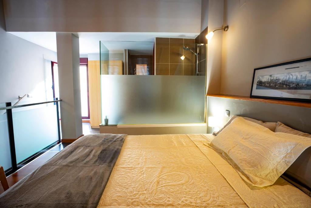 Posteľ alebo postele v izbe v ubytovaní LOFT BETANIA