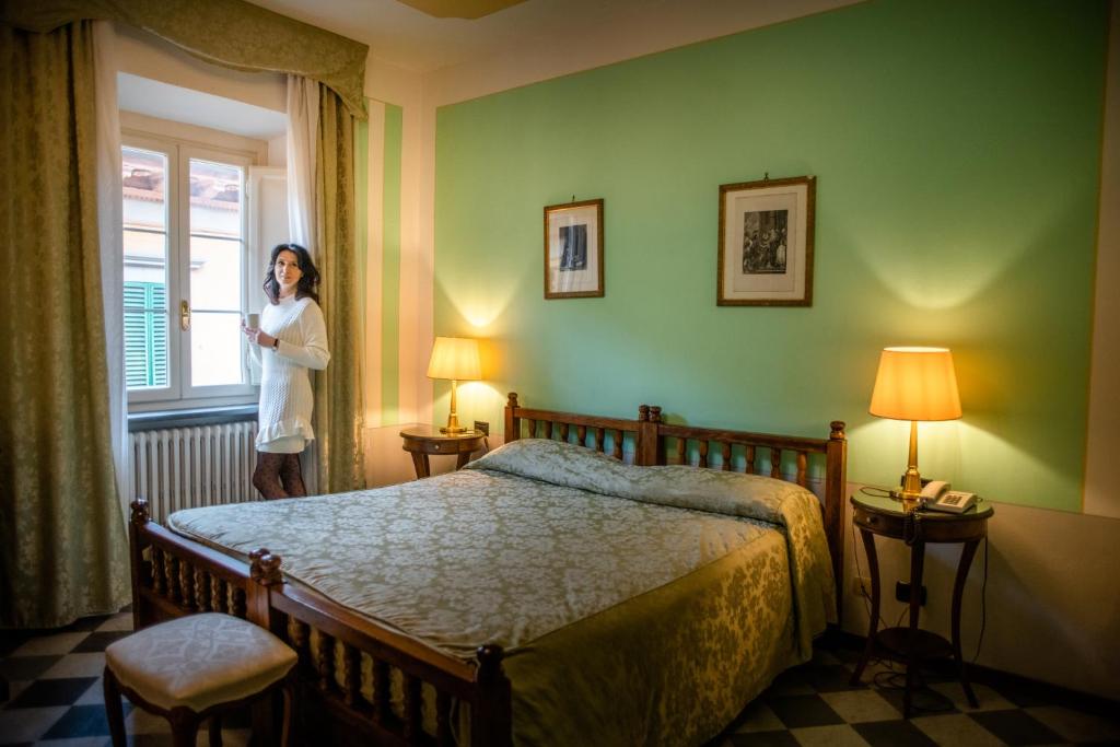 Postel nebo postele na pokoji v ubytování Park Hotel Regina - with air-condition and pool