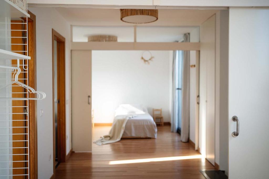 Postel nebo postele na pokoji v ubytování Casa2patis