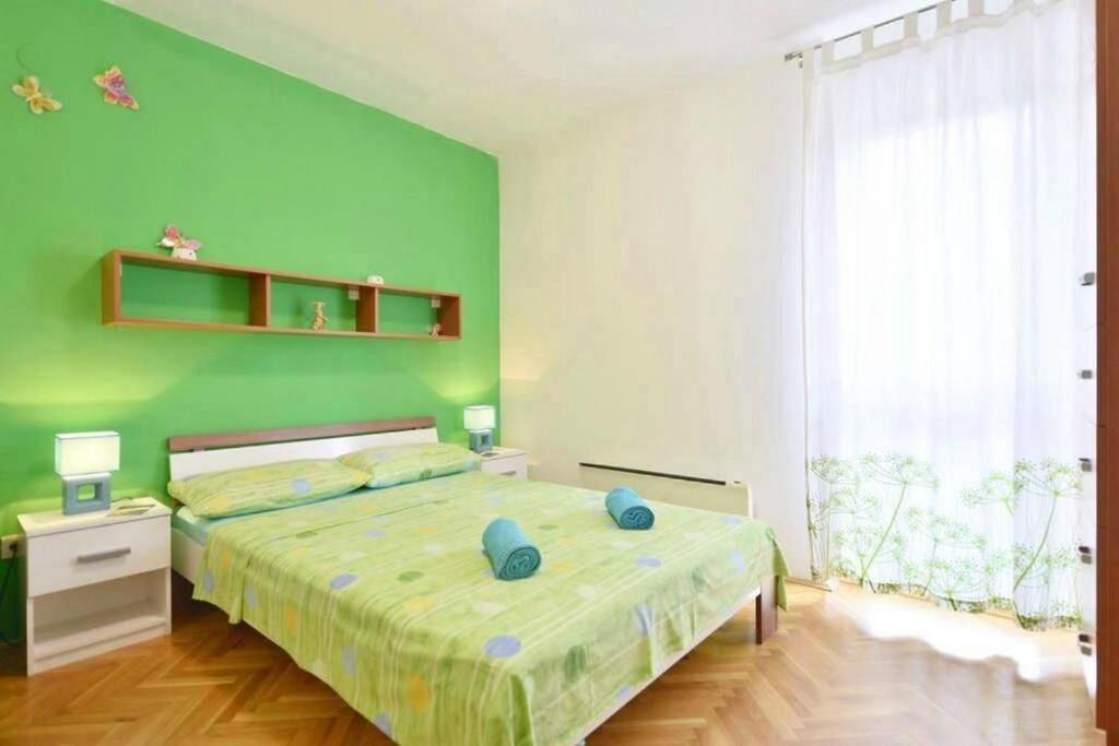 Posteľ alebo postele v izbe v ubytovaní Apartment Vicko