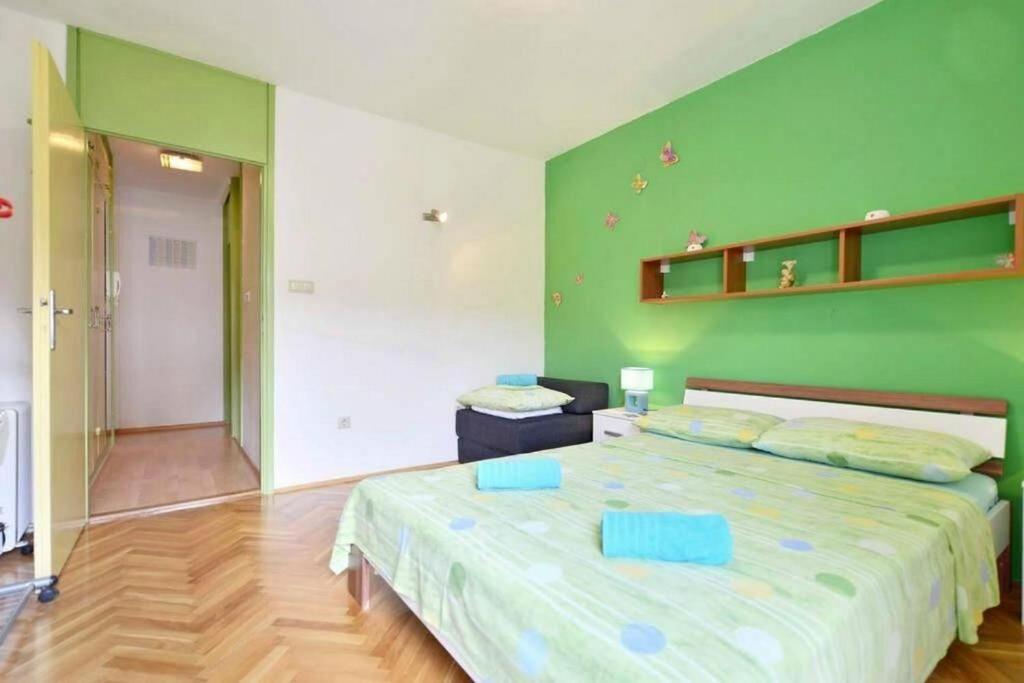 Posteľ alebo postele v izbe v ubytovaní Apartment Vicko