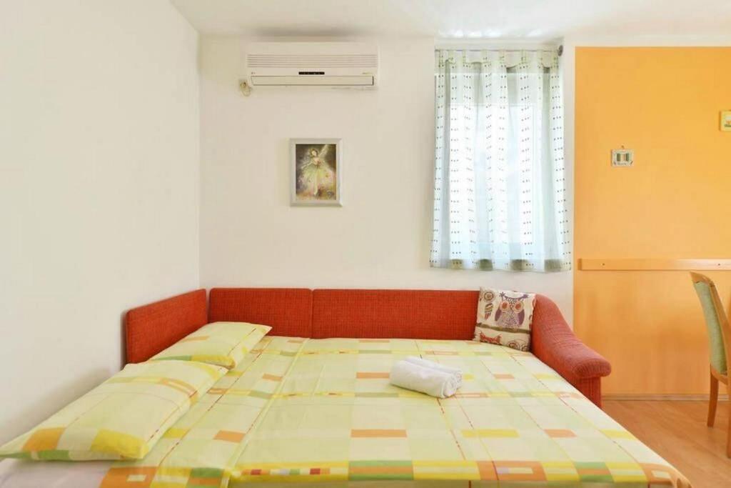 Posteľ alebo postele v izbe v ubytovaní Apartment Vicko